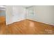 Spacious bedroom with hardwood floors, closet and a bright window at 1830 Huntington Pl, Rock Hill, SC 29732