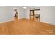 Open dining area with hardwood floors flowing into the kitchen and living spaces at 1830 Huntington Pl, Rock Hill, SC 29732