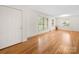 Inviting entryway with hardwood floors, a bright white door, and ample natural light from the windows at 1830 Huntington Pl, Rock Hill, SC 29732