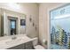 This bathroom features a single vanity and a shower behind a curtain with a nature theme at 2112 Balting Glass Dr, Indian Trail, NC 28079