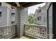Balcony view with other units, lush greenery, and partial view of community pool at 226 Queens Rd # 68, Charlotte, NC 28204