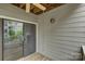 Balcony with ceiling fan and sliding door to the interior at 226 Queens Rd # 68, Charlotte, NC 28204