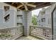 Balcony with view of surrounding condos with ceiling fan at 226 Queens Rd # 68, Charlotte, NC 28204