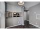 Cozy dining area connected to the kitchen with stainless steel appliances and ample lighting at 226 Queens Rd # 68, Charlotte, NC 28204