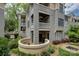 A condo's exterior boasts a private patio, perfect for relaxation and outdoor enjoyment at 226 Queens Rd # 68, Charlotte, NC 28204