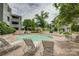 Community pool area features chaise lounges for relaxation and a beautiful gazebo at 226 Queens Rd # 68, Charlotte, NC 28204