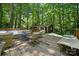 Large backyard deck with a variety of seating arrangements perfect for outdoor entertaining at 2507 Connemara Dr, Matthews, NC 28105