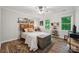 Stylish bedroom showcases vintage accents, natural light, and hardwood flooring at 2507 Connemara Dr, Matthews, NC 28105