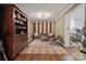 Cozy living room featuring hardwood floors, unique decor, and a comfortable seating arrangement at 2507 Connemara Dr, Matthews, NC 28105
