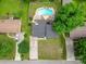 An aerial view showcases a well-maintained home with a large yard, swimming pool, and ample parking space at 2666 Hill Ln, Gastonia, NC 28054
