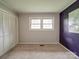 Bedroom with closet, two windows, and one accent wall at 2666 Hill Ln, Gastonia, NC 28054