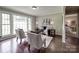 Cozy living room with hardwood floors, a large window, and comfortable seating, perfect for relaxation at 2666 Hill Ln, Gastonia, NC 28054