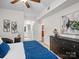 Bright bedroom showcasing the ensuite bathroom, walk-in closet, and doorway to the kitchen at 300 W 5Th St # 433, Charlotte, NC 28202
