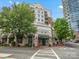 Exterior of building with retail and residential units, featuring Harris Teeter grocery store on the ground floor at 300 W 5Th St # 433, Charlotte, NC 28202