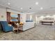 Inviting community area featuring comfortable seating, a large television, and a pool table for recreation at 300 W 5Th St # 433, Charlotte, NC 28202
