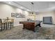 Spacious game room with a classic pool table, perfect for entertaining and relaxation at 300 W 5Th St # 433, Charlotte, NC 28202