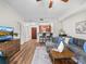 Inviting living room with wood floors, comfortable seating, and an open view into the kitchen at 300 W 5Th St # 433, Charlotte, NC 28202