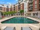 Beautiful community pool with lounge chairs and well-maintained grounds offers a serene escape at 300 W 5Th St # 433, Charlotte, NC 28202