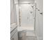 Modern bathroom featuring glass-enclosed shower with white subway tiles and built-in shelving at 320 Lawrence Gray Rd, Charlotte, NC 28262