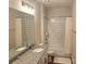 Bathroom featuring granite countertops, a shower and bath combo with white subway tile and a white shower curtain at 320 Lawrence Gray Rd, Charlotte, NC 28262