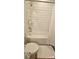Bright bathroom featuring a shower with subway tile, white cabinets, and granite countertop at 320 Lawrence Gray Rd, Charlotte, NC 28262