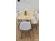 Modern dining room featuring a table with six chairs and wood-style floors at 320 Lawrence Gray Rd, Charlotte, NC 28262