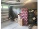 Spacious garage featuring ample storage space and lighting at 320 Lawrence Gray Rd, Charlotte, NC 28262