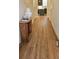 Inviting hallway showcasing wood-style floors and neutral decor, creating a warm and welcoming entrance at 320 Lawrence Gray Rd, Charlotte, NC 28262