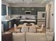 Modern kitchen with green cabinets, stainless steel appliances, and dining table, perfect for cooking and entertaining at 320 Lawrence Gray Rd, Charlotte, NC 28262