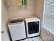 Laundry room featuring side-by-side washer and dryer and overhead storage shelf at 320 Lawrence Gray Rd, Charlotte, NC 28262