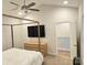 Serene main bedroom with a four-poster bed, modern dresser, and ample closet space at 320 Lawrence Gray Rd, Charlotte, NC 28262