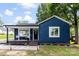 Charming single-story home featuring a welcoming front porch and a freshly landscaped yard at 403 W 2Nd St, Cherryville, NC 28021