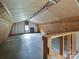 Spacious attic with natural light, ideal for storage or potential living space at 407 S Buckoak St, Stanley, NC 28164