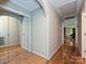 Hallway with hardwood floors leading to the rooms at 407 S Buckoak St, Stanley, NC 28164