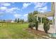 A well-maintained backyard featuring a black fence and lush green grass at 463 Hunton Forest Nw Dr, Concord, NC 28027