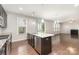 Kitchen island with granite countertops, pendant lighting, and stainless steel appliances at 463 Hunton Forest Nw Dr, Concord, NC 28027