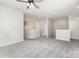 Open loft area featuring a chandelier and several access doors at 463 Hunton Forest Nw Dr, Concord, NC 28027