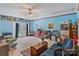Spacious living room featuring shelving, french doors, and comfortable seating at 4810 Shea Ct, Monroe, NC 28110
