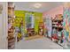 Versatile room showcasing ample storage, natural light from the window, and bright colors at 4810 Shea Ct, Monroe, NC 28110