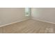 Inviting bedroom featuring neutral paint and plush carpeting at 4912 Grace View Dr, Pineville, NC 28134