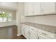 Kitchen with granite countertops, white cabinets, and stainless steel appliances at 4912 Grace View Dr, Pineville, NC 28134
