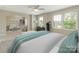 Bright main bedroom featuring an archway, windows, and natural light at 4912 Grace View Dr, Pineville, NC 28134