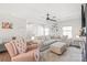Cozy living room with a comfortable sectional sofa, a plush rug, and neutral decor at 5023 Daybell St, Charlotte, NC 28214