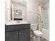 Bathroom features a shower/tub combo, matching cabinets, and a mirror at 5043 Baileys Run Dr, Rock Hill, SC 29732