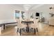 Bright dining area with modern chandelier and a view of the living room at 5043 Baileys Run Dr, Rock Hill, SC 29732