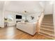 Spacious living room with a fireplace, hardwood floors, and staircase at 5043 Baileys Run Dr, Rock Hill, SC 29732