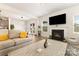Comfortable living room with fireplace, open to the dining area and kitchen at 5043 Baileys Run Dr, Rock Hill, SC 29732