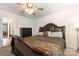 A cozy main bedroom shows the size of the room and access to other areas at 5043 Baileys Run Dr, Rock Hill, SC 29732