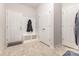 Mudroom with coat hooks, closet, and access to the laundry room and exterior at 5043 Baileys Run Dr, Rock Hill, SC 29732