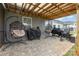 Outdoor brick patio featuring egg chairs, a grill, and a charming outdoor cooking area at 5043 Baileys Run Dr, Rock Hill, SC 29732